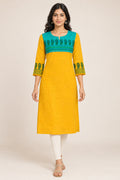 This Yellow Cotton Kurta is crafted using Plain Woven detailing, featuring Plain Body design across the silhouette with Round neck front image displayed on an AI model