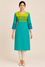 This Sea Green Cotton Kurta is crafted using Digital Print detailing, featuring Printed design across the silhouette with Round neck front image displayed on an AI model