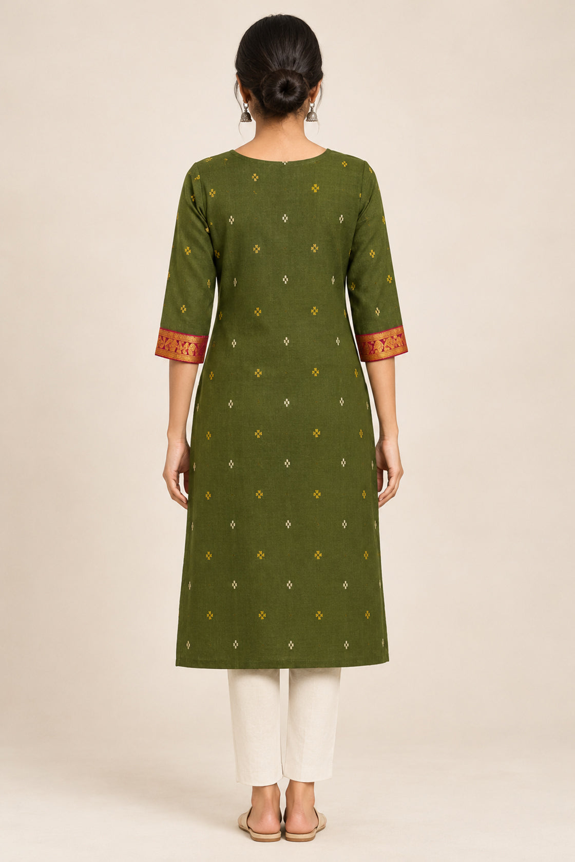 This Mehandi Green Cotton Kurta is crafted using Woven Design detailing, featuring Thread Butta design across the silhouette with Round neck back image displayed on an AI model