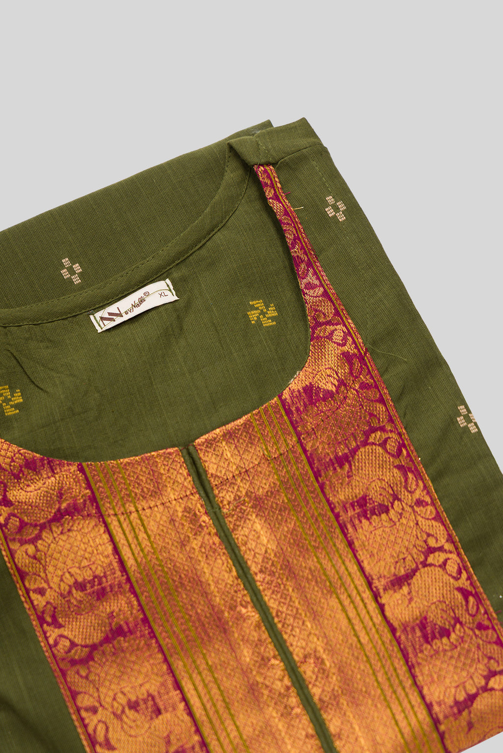 Detailed shot of This Mehandi Green Cotton Kurta is crafted using Woven Design detailing, featuring Thread Butta design across the silhouette with Round neck