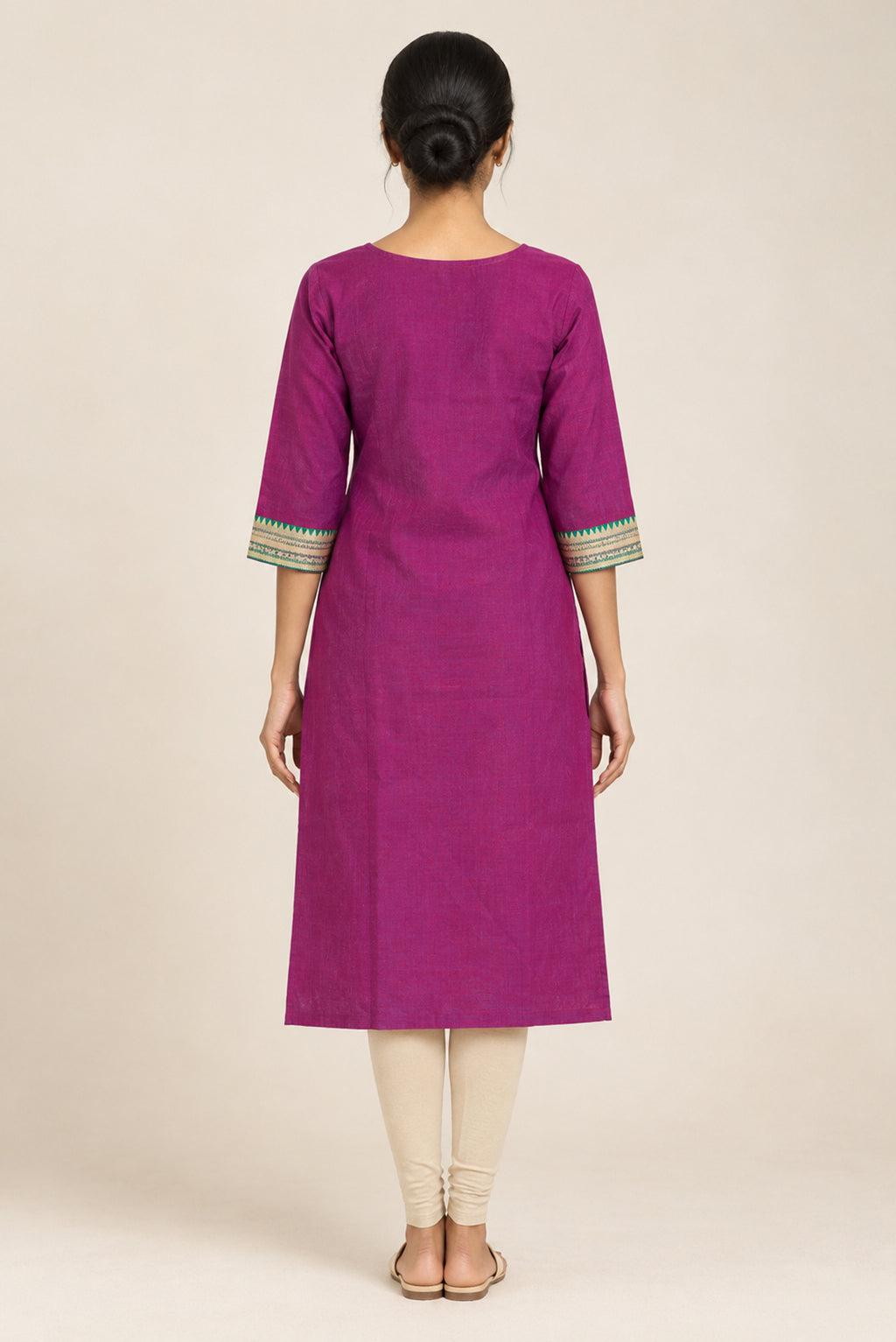 This Magenta Cotton Kurta is crafted using Plain Woven detailing, featuring Plain Body design across the silhouette with U-neck back image displayed on an AI model