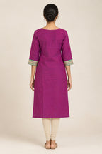 This Magenta Cotton Kurta is crafted using Plain Woven detailing, featuring Plain Body design across the silhouette with U-neck back image displayed on an AI model