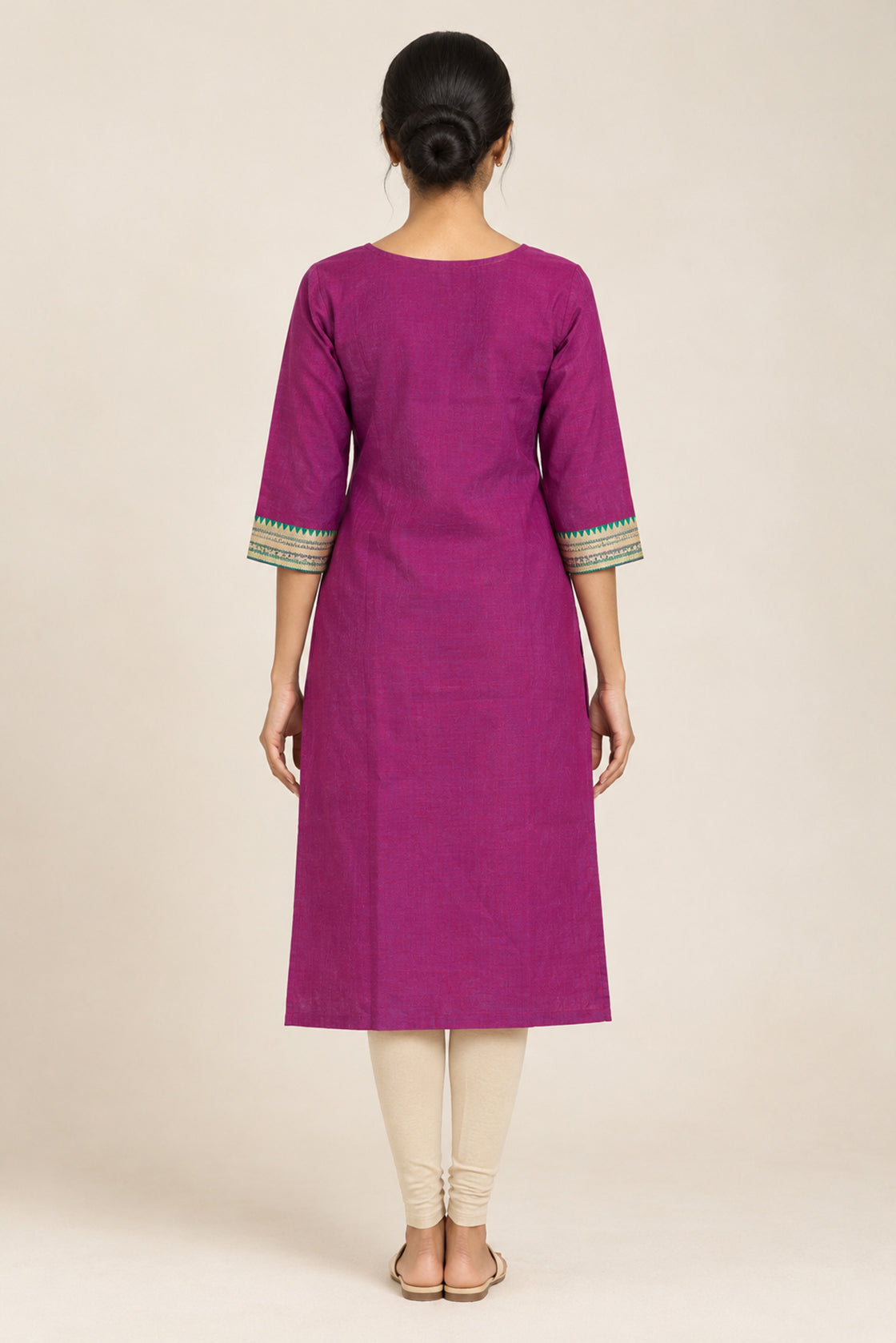 This Magenta Cotton Kurta is crafted using Plain Woven detailing, featuring Plain Body design across the silhouette with U-neck back image displayed on an AI model
