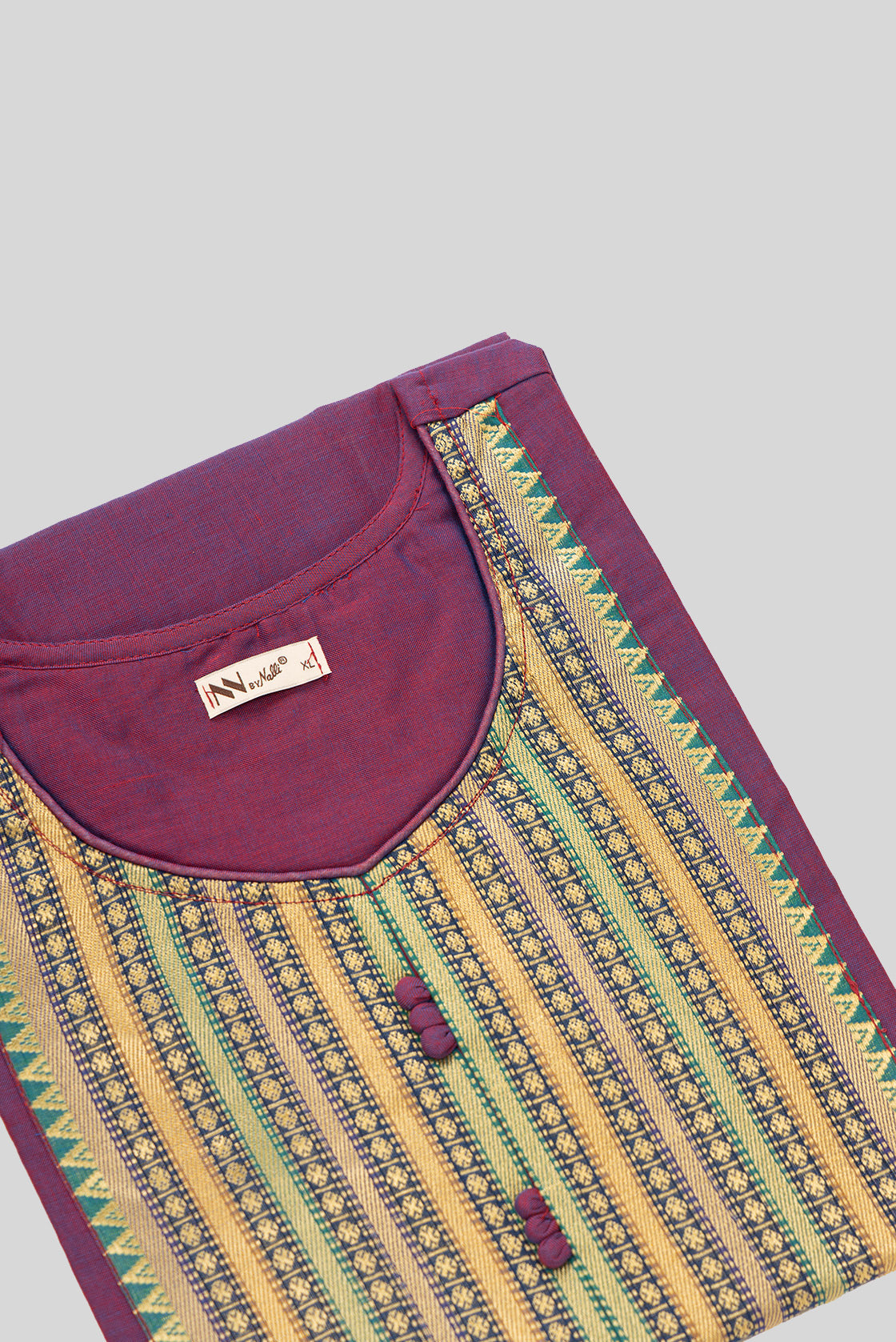 Detailed shot of This Magenta Cotton Kurta is crafted using Plain Woven detailing, featuring Plain Body design across the silhouette with U-neck