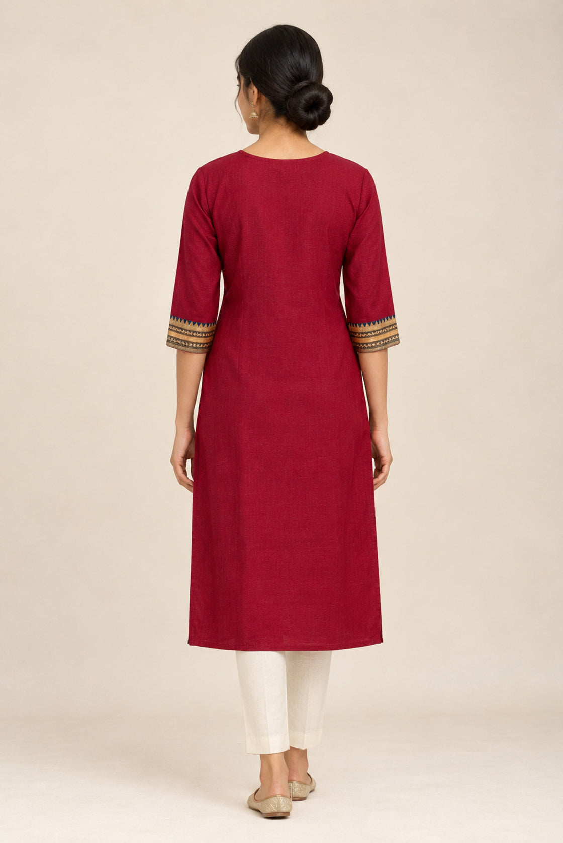 This Maroon Cotton Kurta is crafted using Plain Woven detailing, featuring Plain Body design across the silhouette with U-neck back image displayed on an AI model