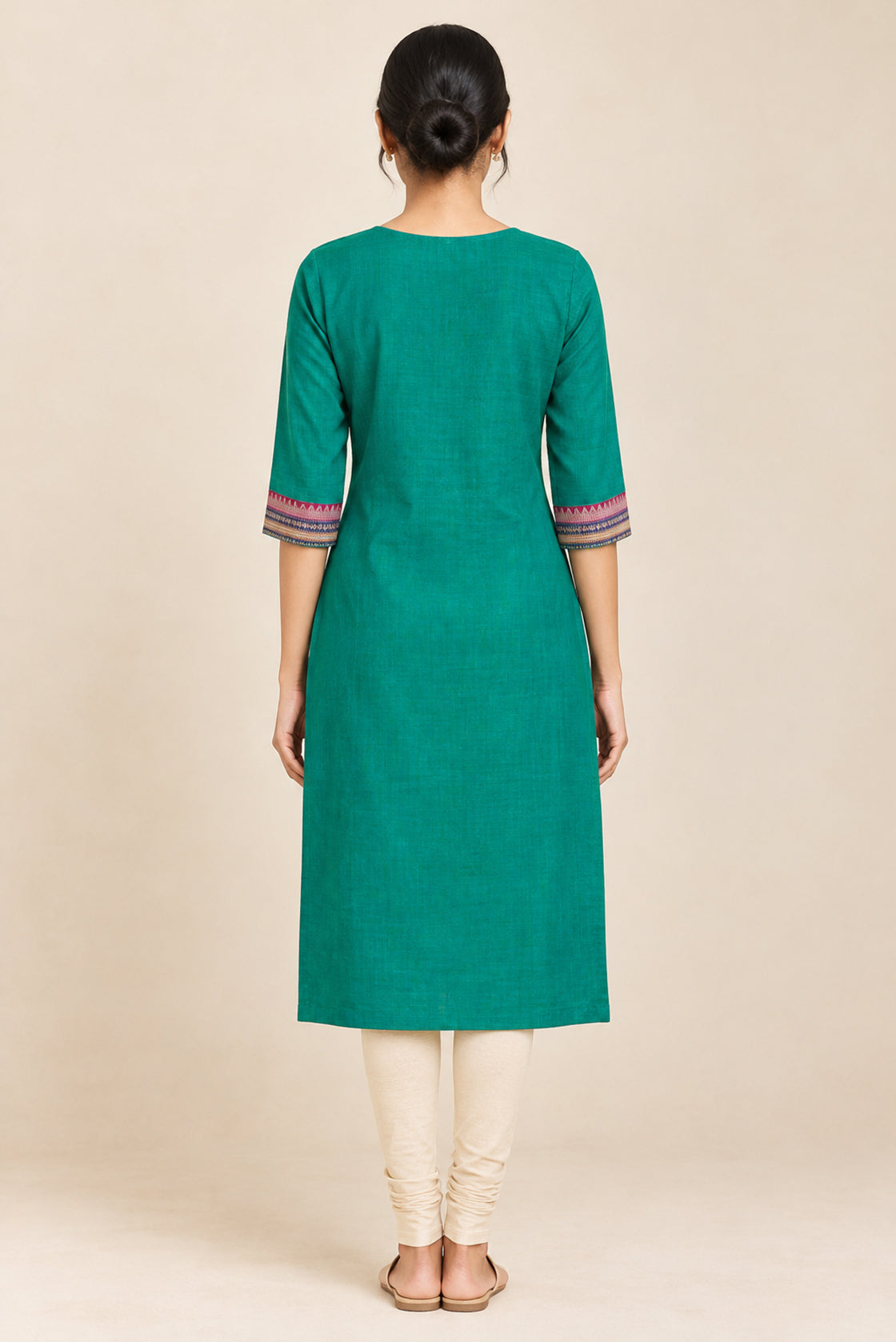 This Sea Green Cotton Kurta is crafted using Plain Woven detailing, featuring Plain Body design across the silhouette with U-neck back image displayed on an AI model