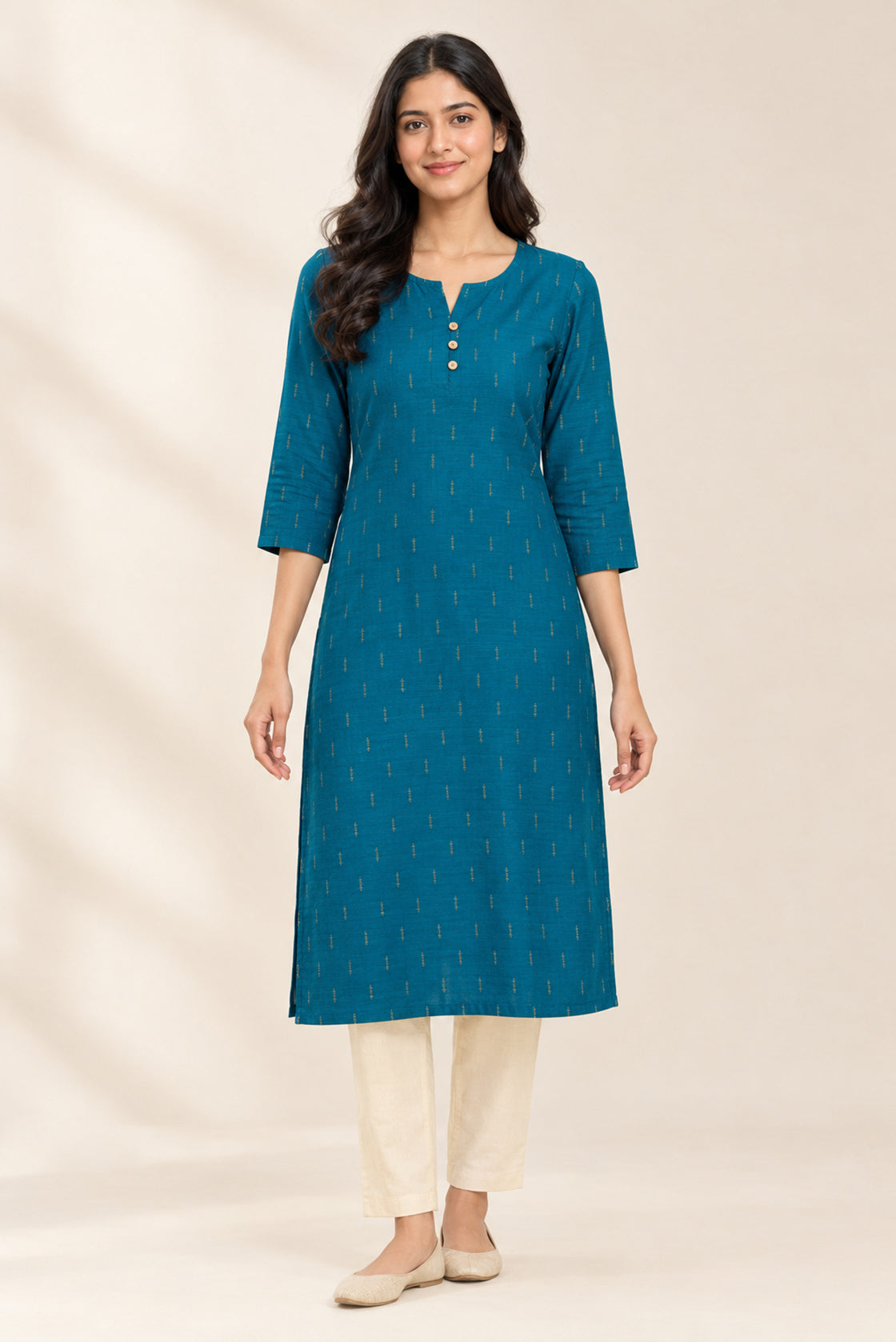 This Peacock Blue Cotton Kurta is crafted using Woven Design detailing, featuring Thread Butta design across the silhouette with Round neck front image displayed on an AI model