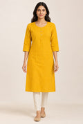 This Yellow Cotton Kurta is crafted using Woven Design detailing, featuring Thread Butta design across the silhouette with Round neck front image displayed on an AI model
