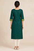 This Bottle Green Cotton Kurta is crafted using Woven Design detailing, featuring Thread Butta design across the silhouette with Keyhole neck back image displayed on an AI model