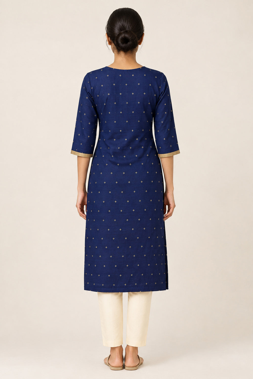 This Navy Blue Cotton Kurta is crafted using Woven Design detailing, featuring Thread Butta design across the silhouette with V-neck back image displayed on an AI model