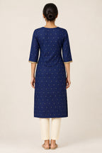 This Navy Blue Cotton Kurta is crafted using Woven Design detailing, featuring Thread Butta design across the silhouette with V-neck back image displayed on an AI model