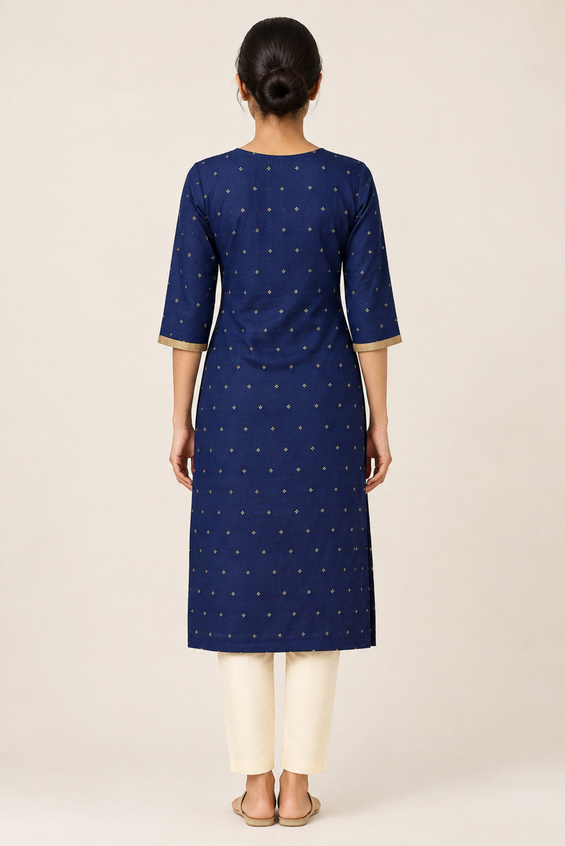 This Navy Blue Cotton Kurta is crafted using Woven Design detailing, featuring Thread Butta design across the silhouette with V-neck back image displayed on an AI model