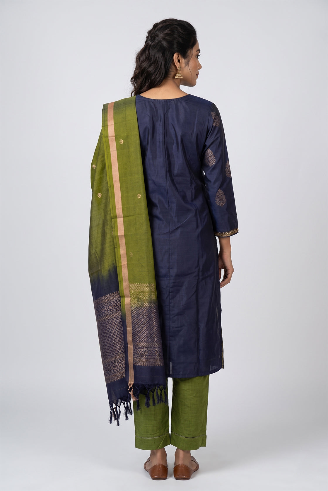 Navy Blue Pure Silk Womens Kurta set featuring Zari Butta Kurta paired with Mehandi Green Plain Body bottom and a Zari Butta dupatta in Mehandi Green back image displayed on an AI model