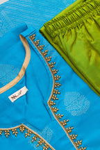 Detailed shot of Sky Blue Pure Silk Womens Kurta set featuring Zari Butta Kurta paired with Mehandi Green Plain Body bottom and a Zari Butta dupatta in Mehandi Green