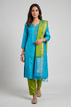 Sky Blue Pure Silk Womens Kurta set featuring Zari Butta Kurta paired with Mehandi Green Plain Body bottom and a Zari Butta dupatta in Mehandi Green