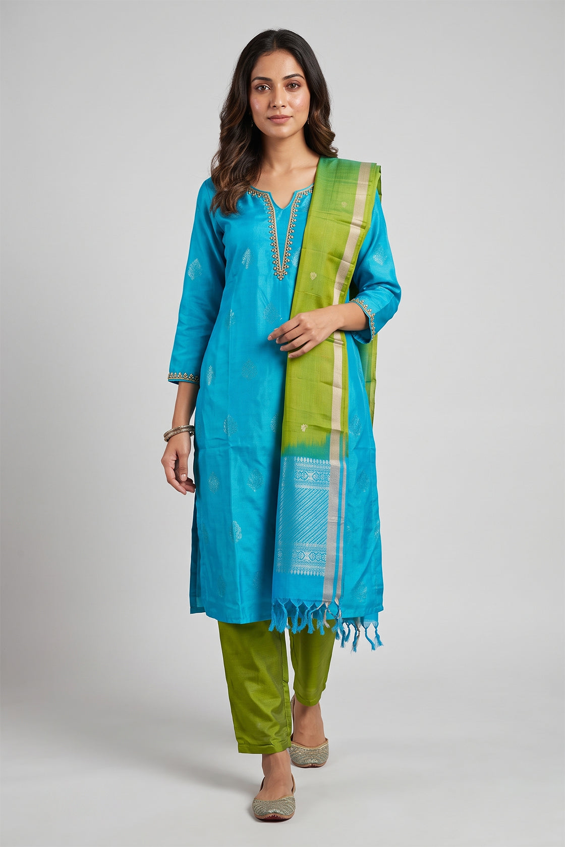 Sky Blue Pure Silk Womens Kurta set featuring Zari Butta Kurta paired with Mehandi Green Plain Body bottom and a Zari Butta dupatta in Mehandi Green