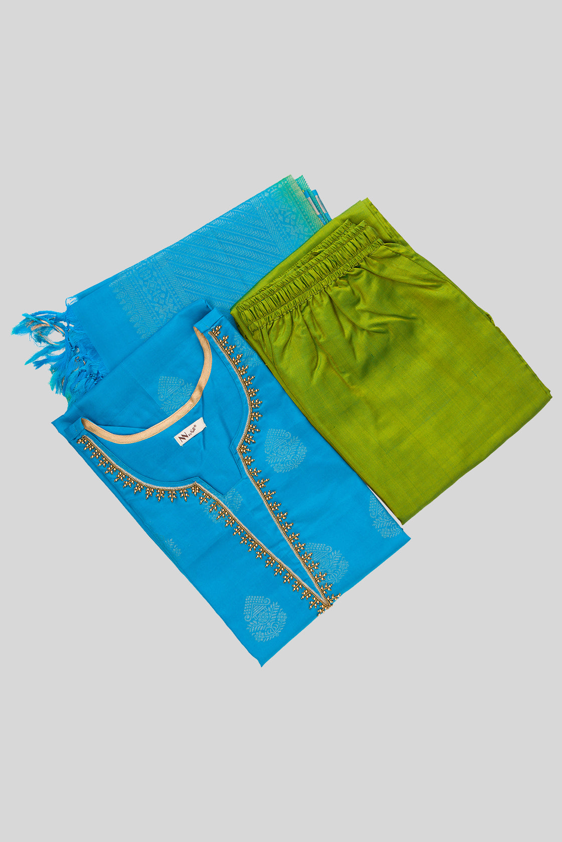 Flat lay of Sky Blue Pure Silk Womens Kurta set featuring Zari Butta Kurta paired with Mehandi Green Plain Body bottom and a Zari Butta dupatta in Mehandi Green