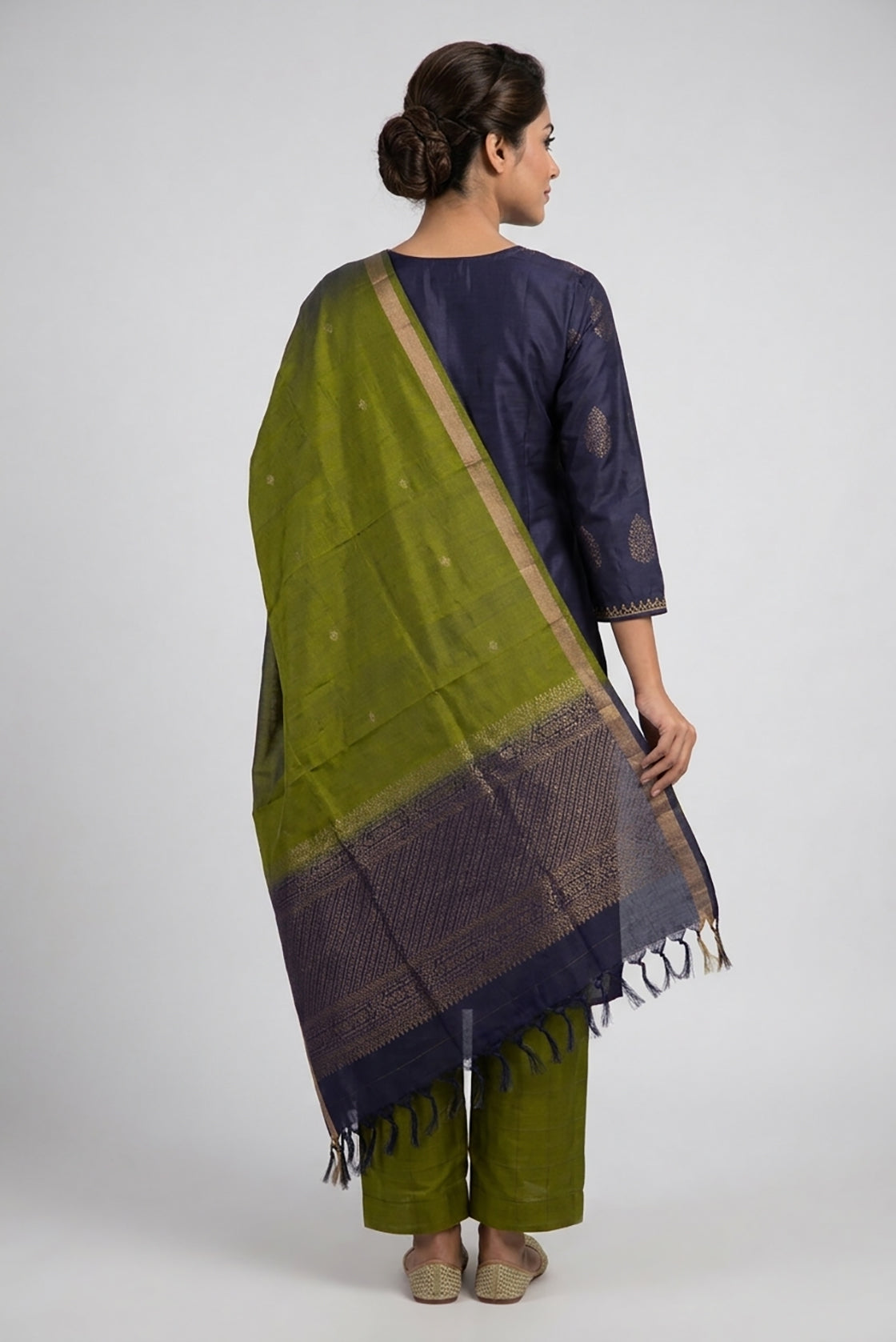 Navy Blue Pure Silk Womens Kurta set featuring Zari Butta Kurta paired with Mehandi Green Plain Body bottom and a Zari Butta dupatta in Mehandi Green back image displayed on an AI model