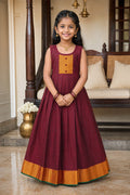 Maroon  Kids Ethnic Dress featuring a U-neck, Sleeveless Design and Plain Body Pattern with Gold Zari Detailing