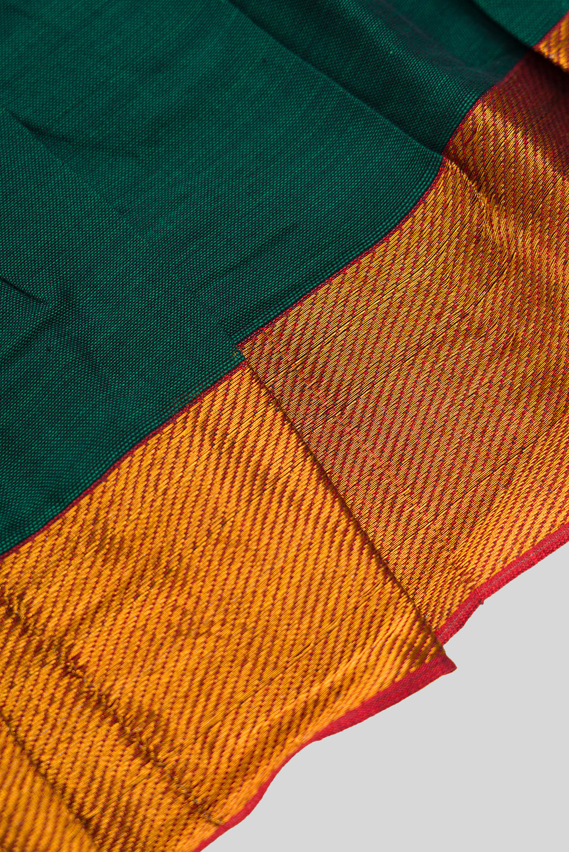 Detailed shot of Green  Kids Ethnic Dress featuring a U-neck, Sleeveless Design and Plain Body Pattern with Gold Zari Detailing