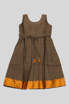 Flat lay back image of Brown  Kids Ethnic Dress featuring a U-neck, Sleeveless Design and Plain Body Pattern with Gold Zari Detailing