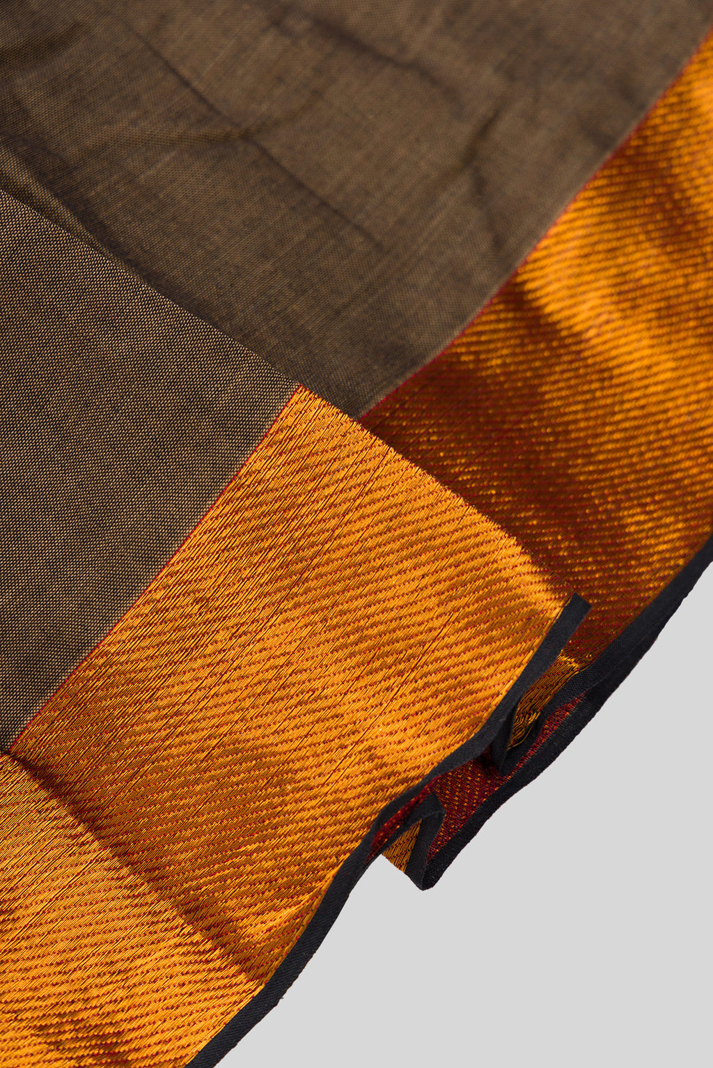 Detailed shot of Brown  Kids Ethnic Dress featuring a U-neck, Sleeveless Design and Plain Body Pattern with Gold Zari Detailing
