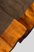 Detailed shot of Brown  Kids Ethnic Dress featuring a U-neck, Sleeveless Design and Plain Body Pattern with Gold Zari Detailing