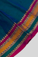 Detailed shot of Peacock Blue  Kids Ethnic Dress featuring a U-neck, Sleeveless Design and Plain Body Pattern with No Color Zari Detailing