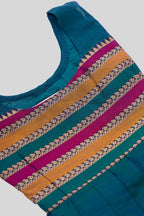Close up blouse image of Peacock Blue  Kids Ethnic Dress featuring a U-neck, Sleeveless Design and Plain Body Pattern with No Color Zari Detailing