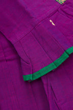 Detailed shot of Green Readymade Cotton Pavadai Set with Zari Butta on the body and Thread Border