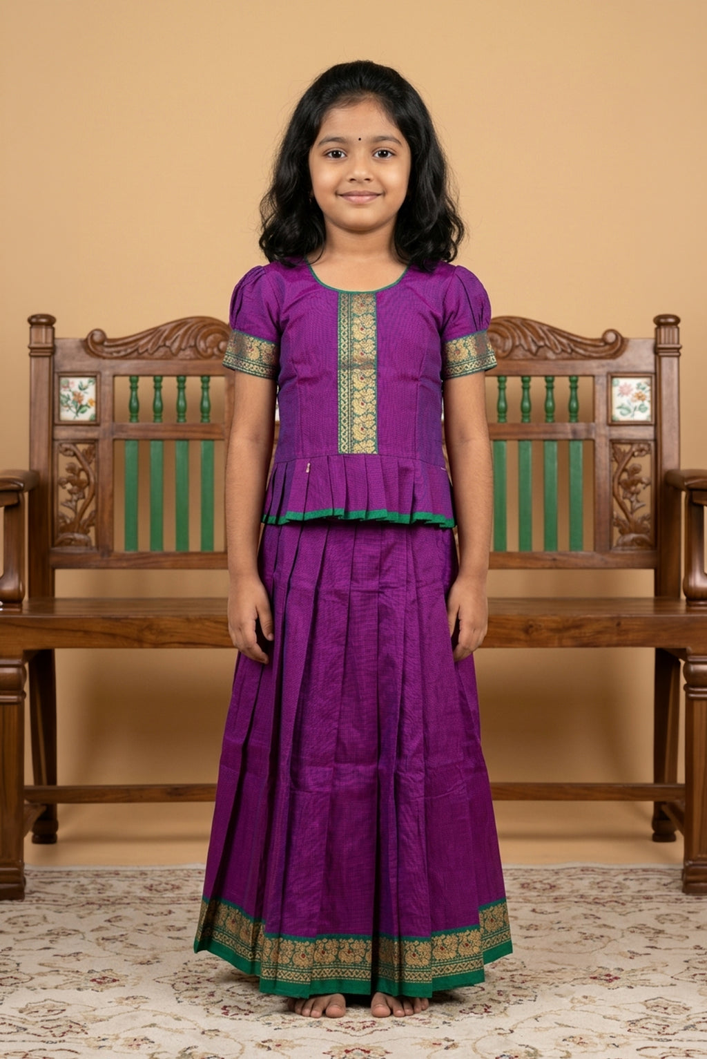 Green Readymade Cotton Pavadai Set with Zari Butta on the body and Thread Border displayed on a mannequin