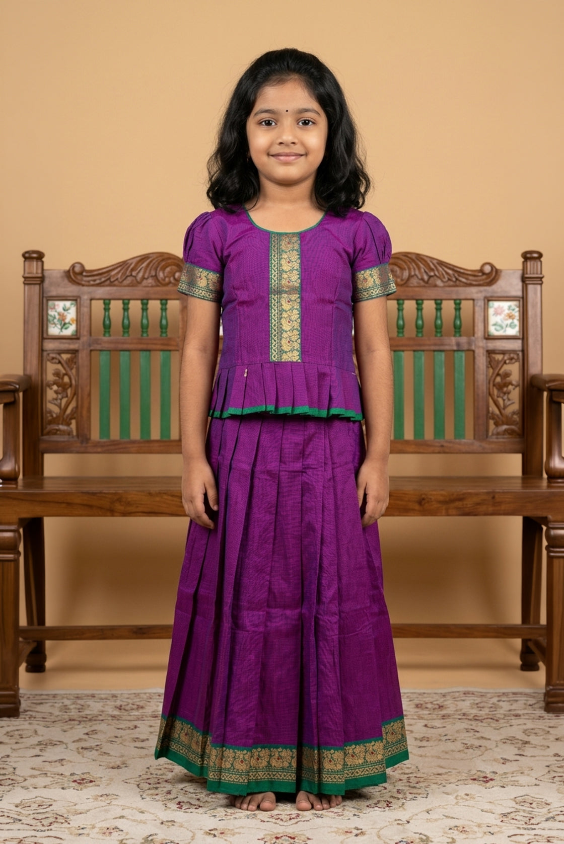Green Readymade Cotton Pavadai Set with Zari Butta on the body and Thread Border displayed on a mannequin