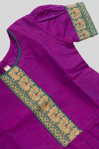Close up sleeve details of Green Readymade Cotton Pavadai Set with Zari Butta on the body and Thread Border