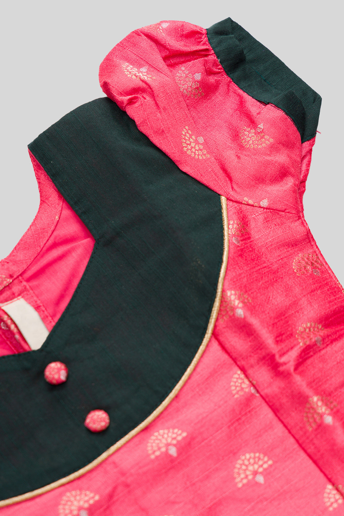 Close up sleeve details of Green Readymade Cotton Pavadai Set with Zari Butta on the body and Fancy Border