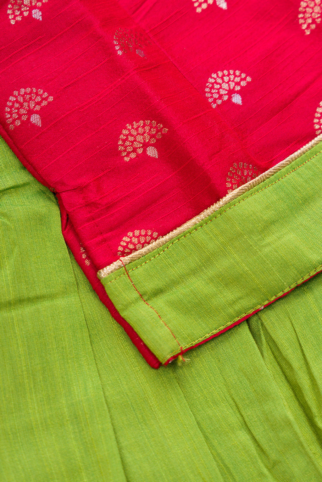 Detailed shot of Green Readymade Cotton Pavadai Set with Zari Butta on the body and Fancy Border