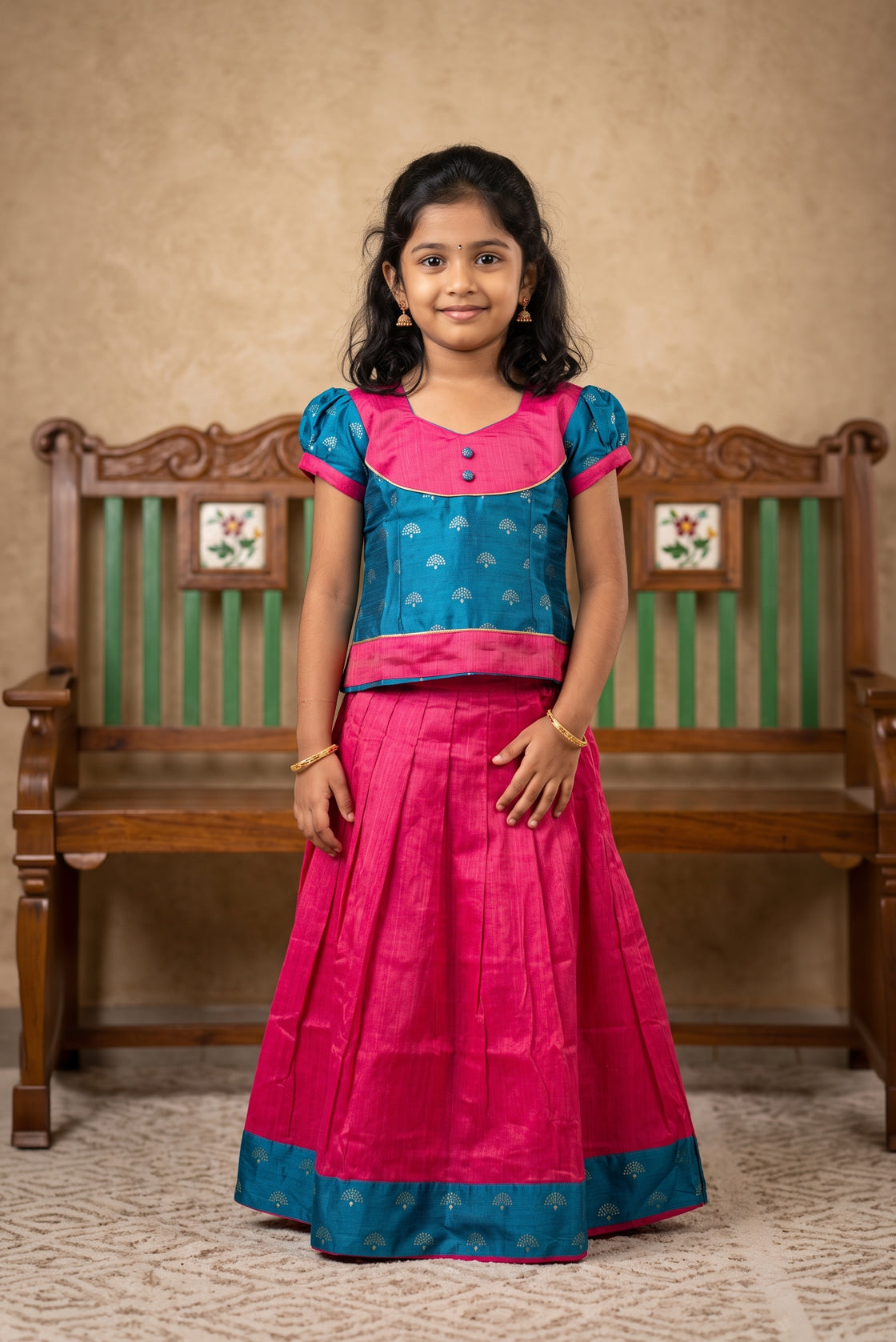 Green Readymade Cotton Pavadai Set with Zari Butta on the body and Fancy Border displayed on a mannequin
