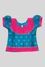 Close up blouse image of Green Readymade Cotton Pavadai Set with Zari Butta on the body and Fancy Border