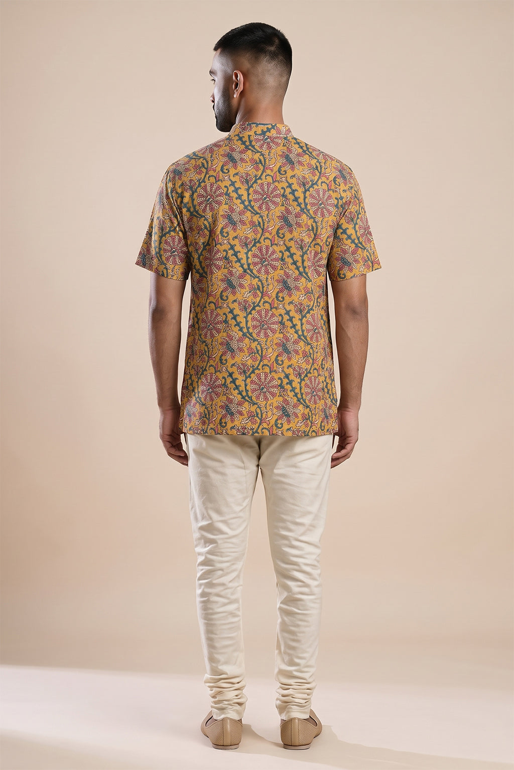 Mustard Pure Cotton kalamkari Print Mens Kurta back image displayed on an AI model