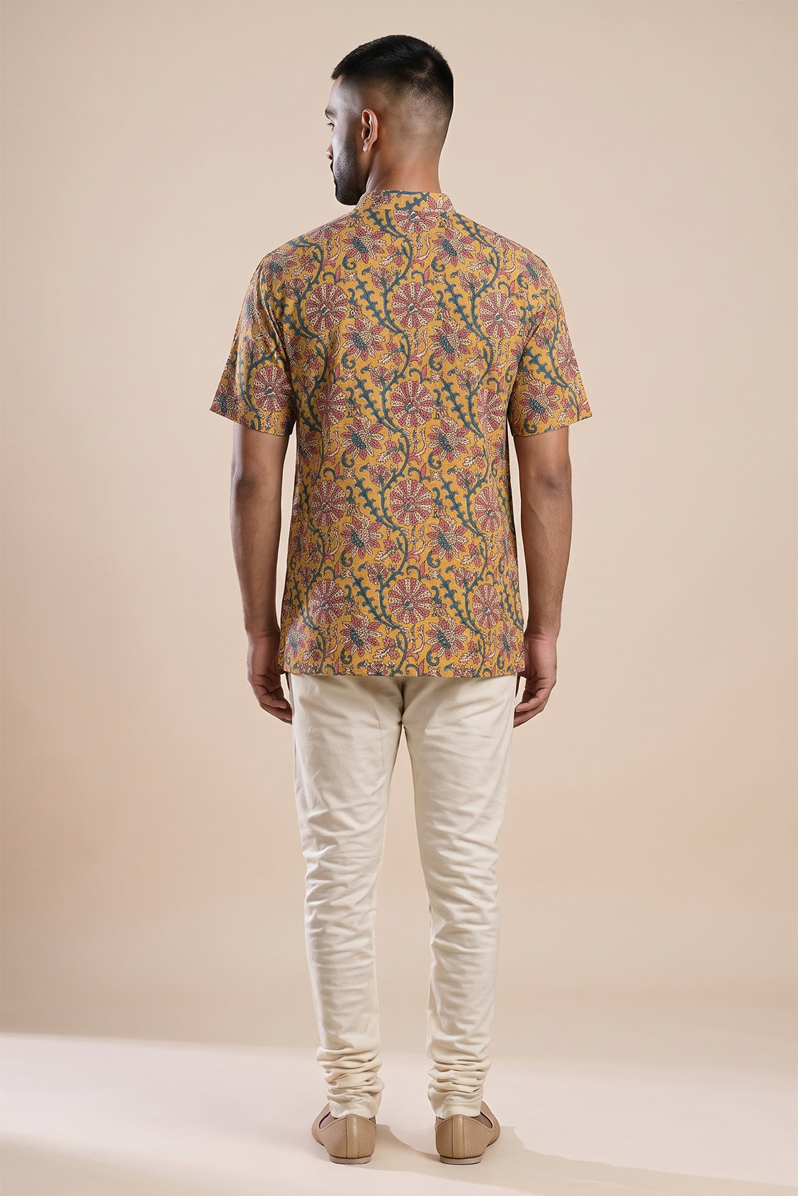 Mustard Pure Cotton kalamkari Print Mens Kurta back image displayed on an AI model