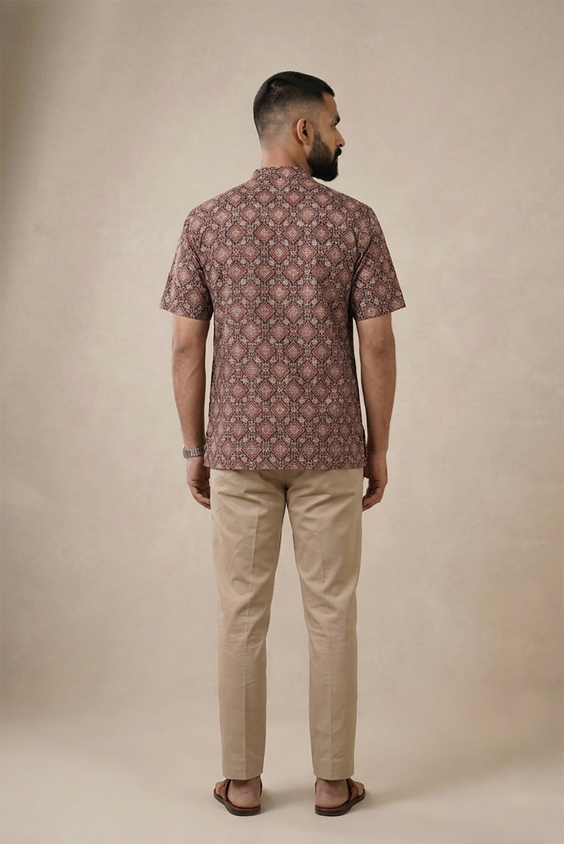 Black Pure Cotton Printed Mens Kurta back image displayed on an AI model