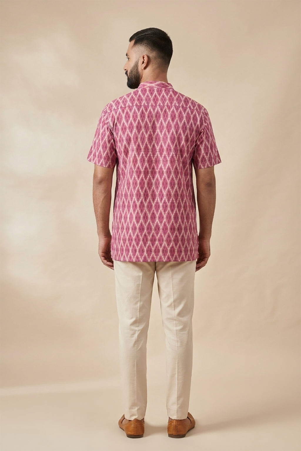 Pink Pure Cotton Ikat Print Mens Kurta back image displayed on an AI model