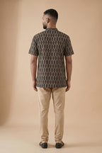 Black Pure Cotton Ikat Print Mens Kurta back image displayed on an AI model
