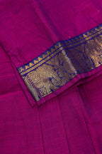 Detailed shot of Mehandi Green Readymade Cotton Pavadai Set with Zari Butta on the body and Zari Border