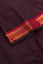 Detailed shot of Mehandi Green Readymade Cotton Pavadai Set with Zari Butta on the body and Zari And Thread Border