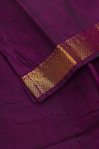 Detailed shot of Mehandi Green Readymade Cotton Pavadai Set with Zari Butta on the body and Zari And Thread Border