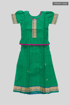 Flat lay front image of Mehandi Green Readymade Cotton Pavadai Set with Zari Butta on the body and Thread Border