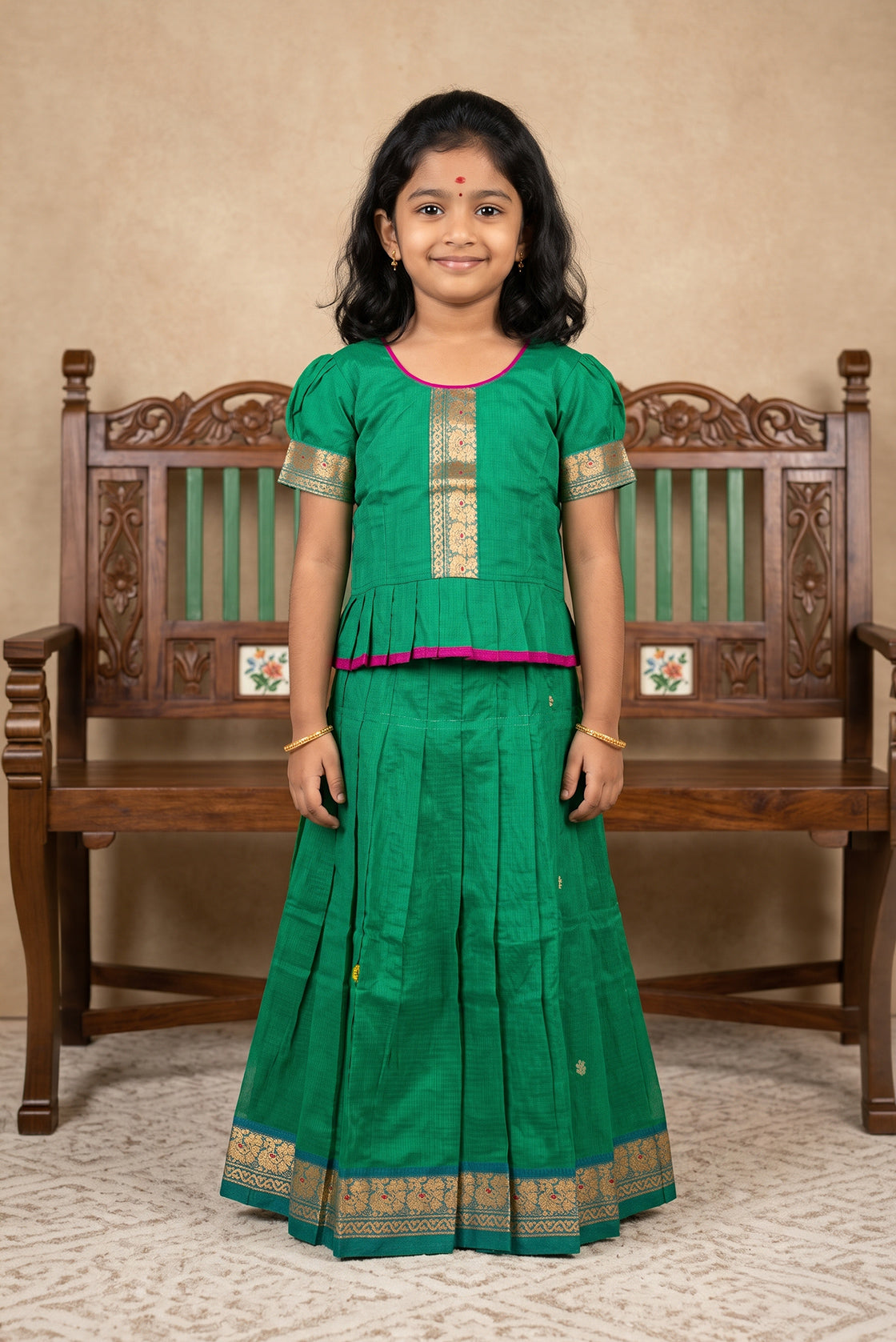 Mehandi Green Readymade Cotton Pavadai Set with Zari Butta on the body and Thread Border displayed on a mannequin
