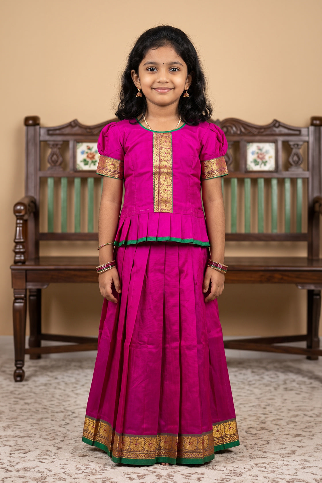 Mehandi Green Readymade Cotton Pavadai Set with Zari Butta on the body and Thread Border displayed on a mannequin