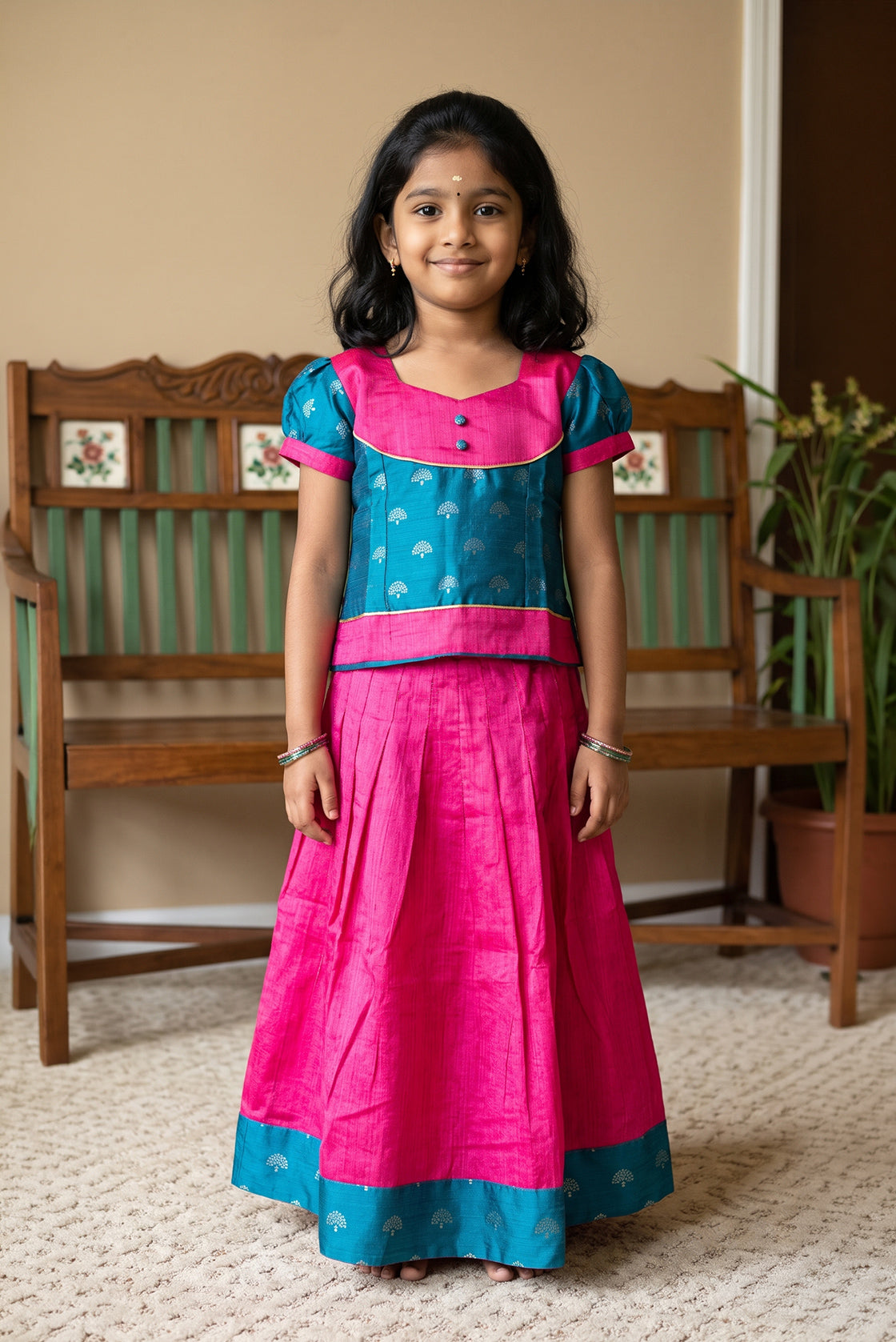 Pink Readymade Cotton Pavadai Set with Zari Butta on the body and Fancy Border displayed on a mannequin
