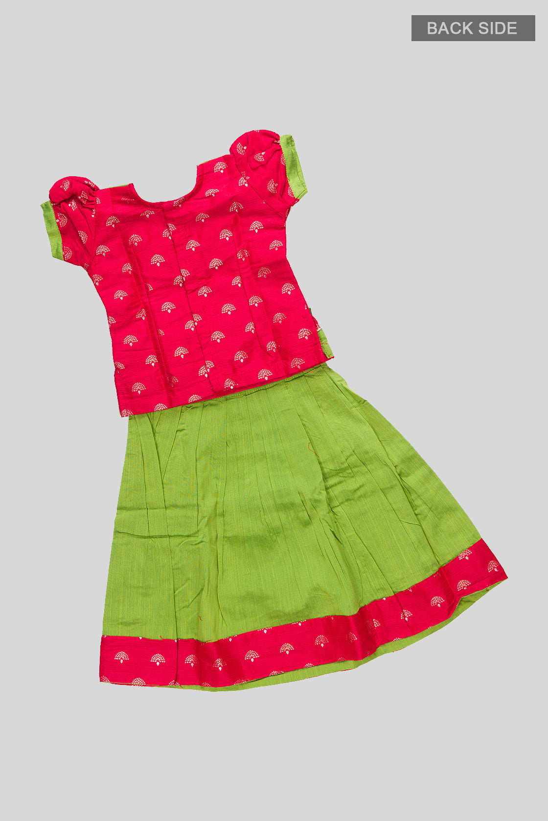 Flat lay back image of Parrot Green Readymade Cotton Pavadai Set with Zari Butta on the body and Fancy Border